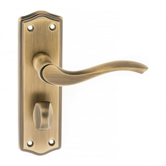 Old English Warwick Lever On WC Turn Backplate Pair Of Door Handles In Matt Antique Brass