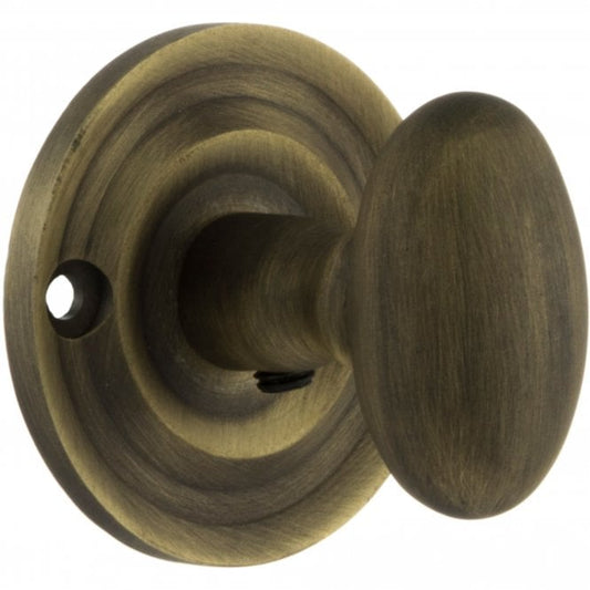 Old English WC Turn And Release Knob Style On Round Rose In Matt Antique Brass