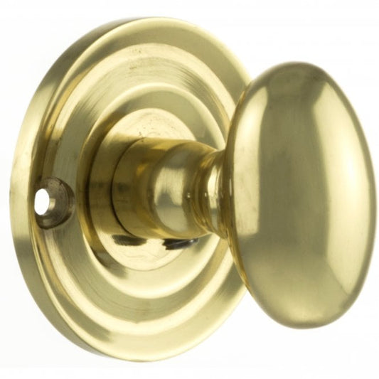 Old English WC Turn And Release Knob Style On Round Rose In Polished Brass